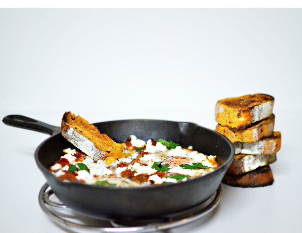 Shakshouka or Shakshuka (Eggs Baked In A Tomato Sauce)