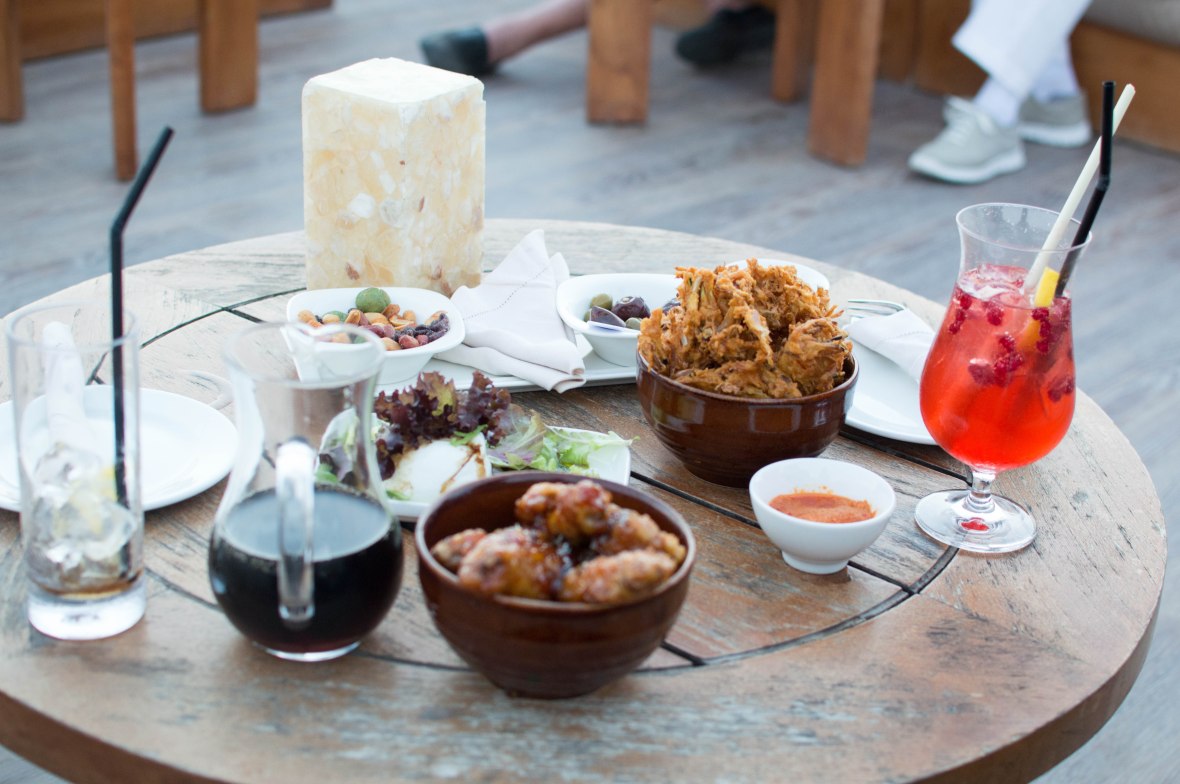 Burratina With Pesto, Crispy Lemon, Chili And Coriander Chicken Wings And Vegetable Fritters, Moon Bar, Banyan Tree Al Wadi, Ras Al Khaimah, UAE