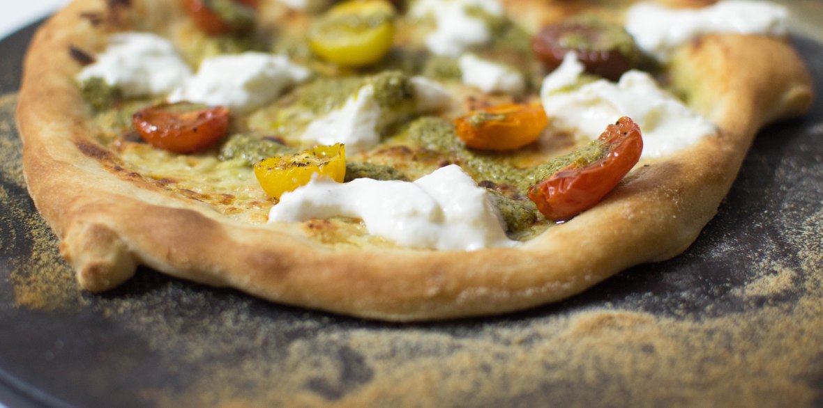 Garlic Cream Based Pizza With Slow Roasted Tomatoes, Burrata And Pesto